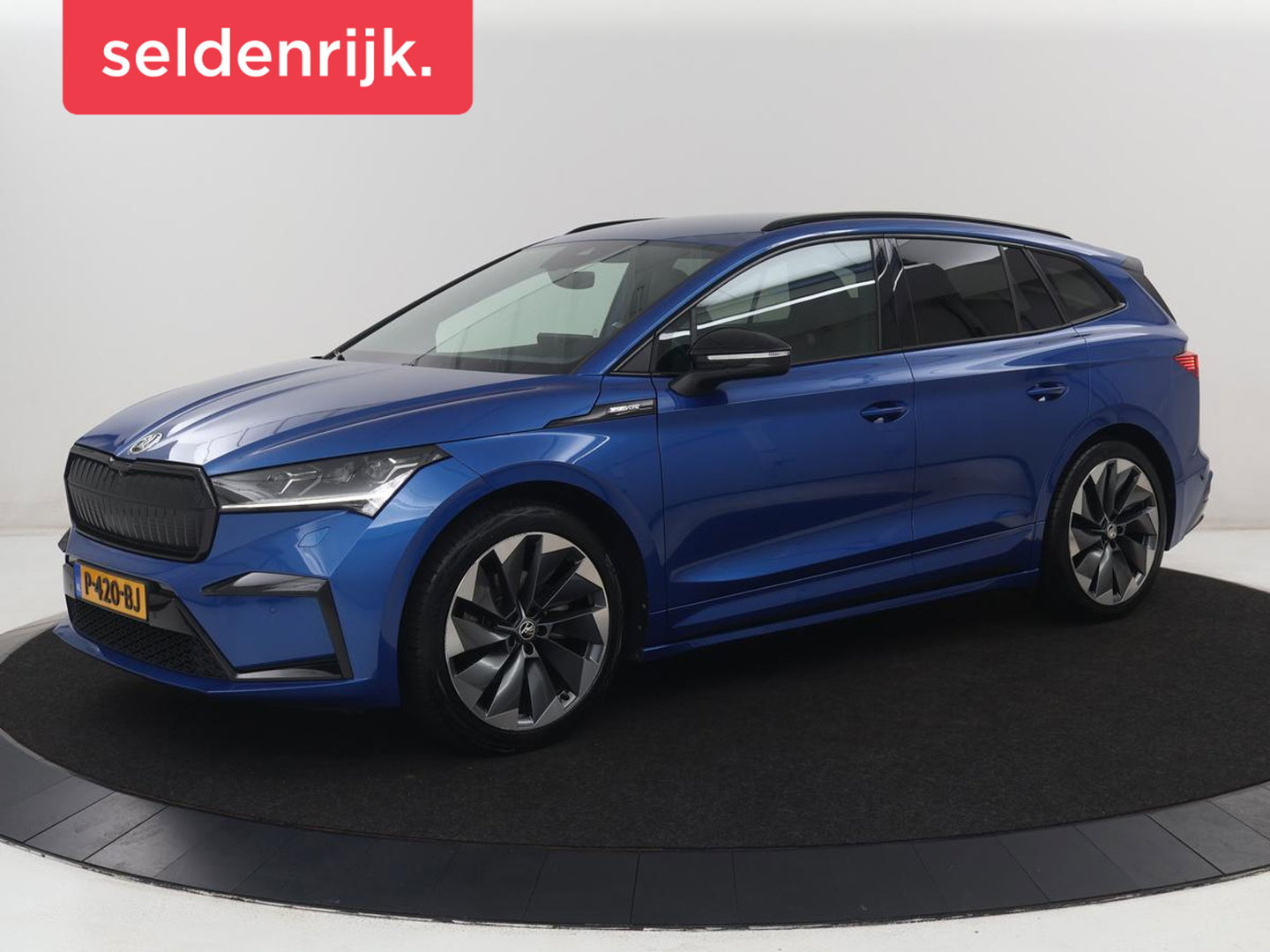 Škoda Enyaq iV 80 Sportline | SOH 92.7% | Leder/alcantara | Stuur verwarming | Camera | Park assist | Cruise control | Carplay | Sfeerverlichting | 21''