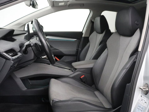 Škoda Enyaq iV 60 | SOH 92,4% | Panoramadak | Stoel/stuur verwarming | Half leder | Adaptive cruise | Carplay | Virtueel dashboard | Sfeerverlichting | Climate control | Camera | Park assist |