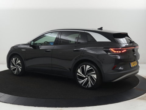 Volkswagen ID.4 First Max 77 kWh | SOH 91,9% | Panoramadak | Leder/alcantara | Memory | Stuur/stoel verwarming | Adaptive cruise | 360 camera | Dodehoek detectie | Carplay | Sfeerverlichting |