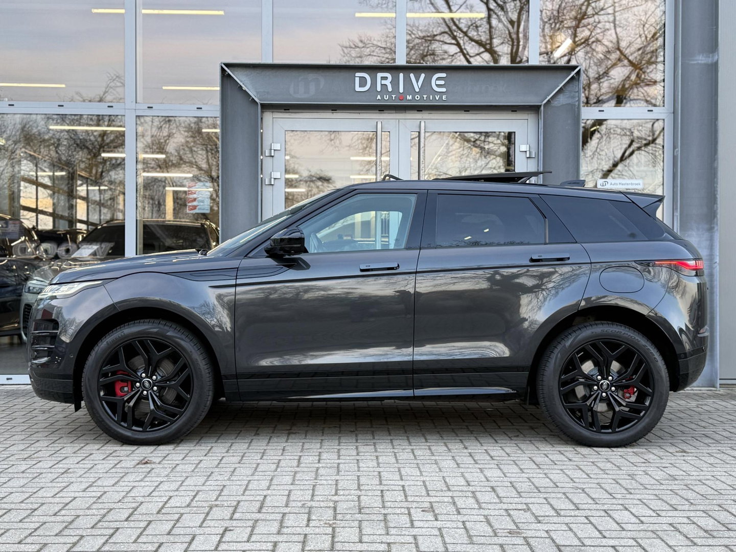 Land Rover Range Rover Evoque 1.5 P300e AWD R-Dynamic HSE Black Style|Schuif/kantel dak|Sfeer|Meridian|Matrix|Trekhaak