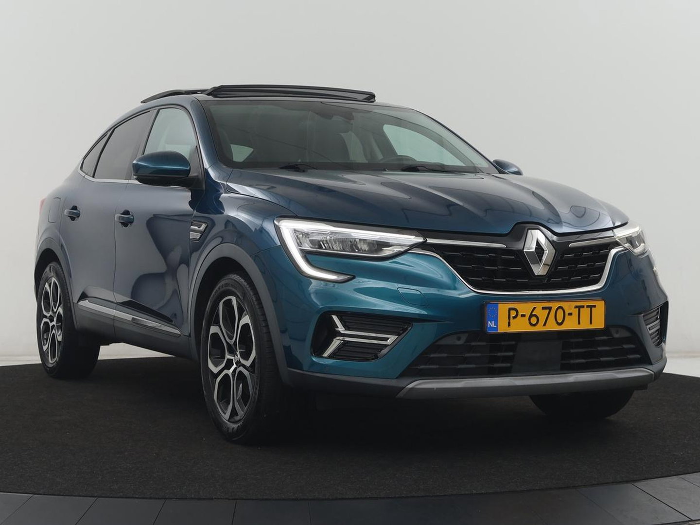 Renault Arkana 1.6 E-Tech Hybrid 145 Intens | Panoramadak | Half leder | Carplay | Adaptive cruise | Dodehoek detectie | Camera | Park assist | Climate control | Trekhaak