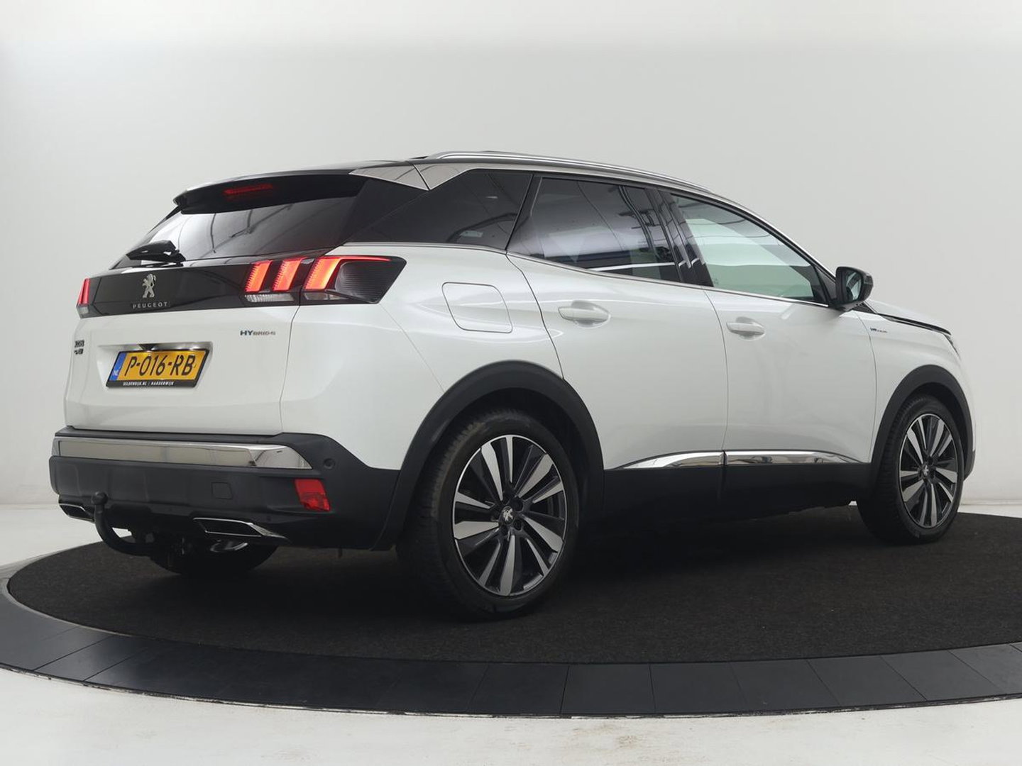 Peugeot 3008 1.6 HYbrid4 300 Première Pack | SOH 93,8% | Panoramadak | Leder/alacantara | Memory | Stoelverwarming | Carplay | 360 camera | Trekhaak | PHEV