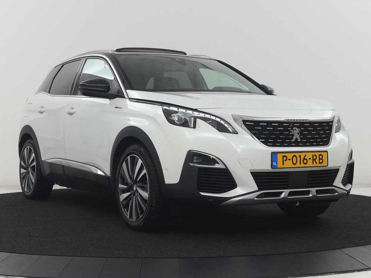 Peugeot 3008 1.6 HYbrid4 300 Première Pack | SOH 93,8% | Panoramadak | Leder/alacantara | Memory | Stoelverwarming | Carplay | 360 camera | Trekhaak | PHEV