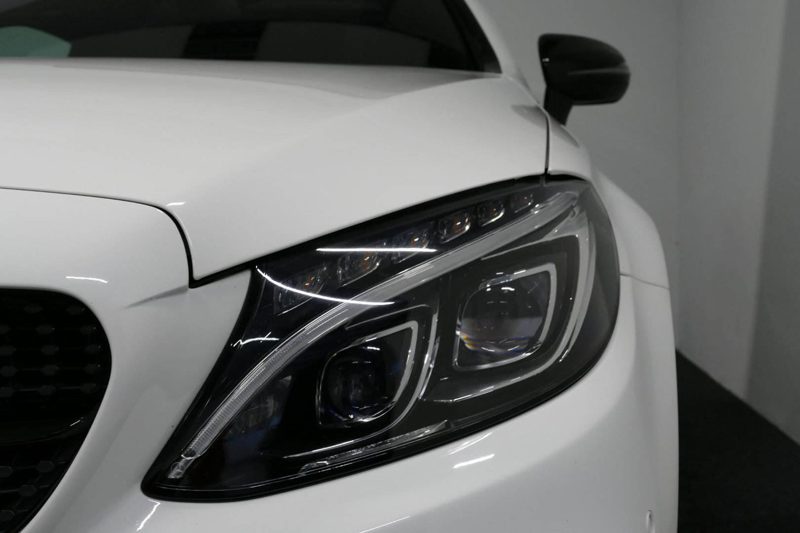 Mercedes-Benz C-Klasse Coupé 200 AMG Line Night Edition / Panoramadak / Apple Carplay - Android Auto / Stoelverwarming / 19'' LMV / Navigatie / Cruise Control / Night Pakket / LED koplampen / Agility Control