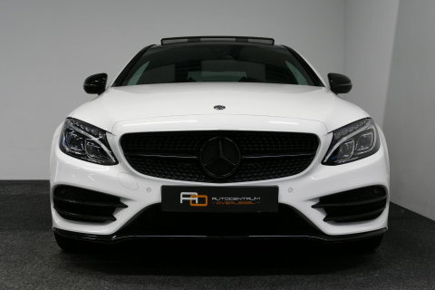 Mercedes-Benz C-Klasse Coupé 200 AMG Line Night Edition / Panoramadak / Apple Carplay - Android Auto / Stoelverwarming / 19'' LMV / Navigatie / Cruise Control / Night Pakket / LED koplampen / Agility Control