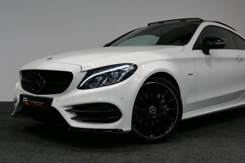 Mercedes-Benz C-Klasse Coupé 200 AMG Line Night Edition / Panoramadak / Apple Carplay - Android Auto / Stoelverwarming / 19'' LMV / Navigatie / Cruise Control / Night Pakket / LED koplampen / Agility Control