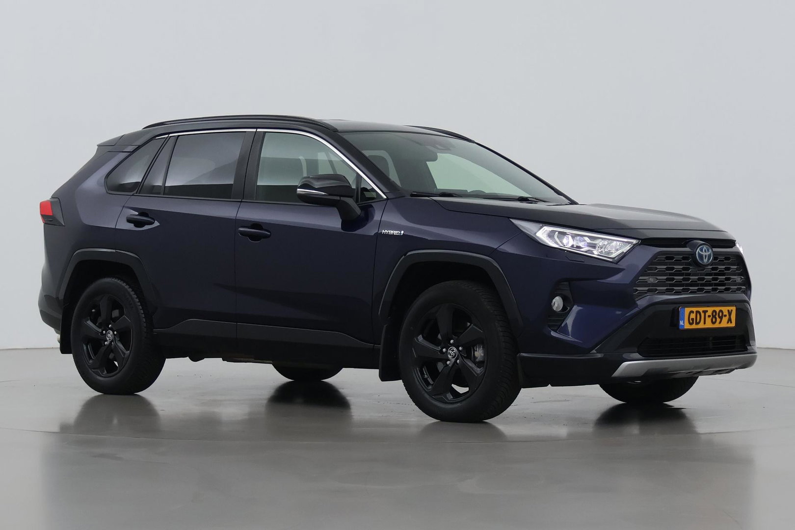 Toyota RAV4 2.5 Hybrid Bi-Tone | ACC | JBL Audio | Stoel+Stuurverwarming | Elektrische Achterklep | Keyless | LED | Camera | 18 Inch