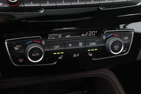 BMW X1 sDrive20i Centennial High Executive | Panoramadak | Head-Up | Vol-Leder | Stoelverwarming