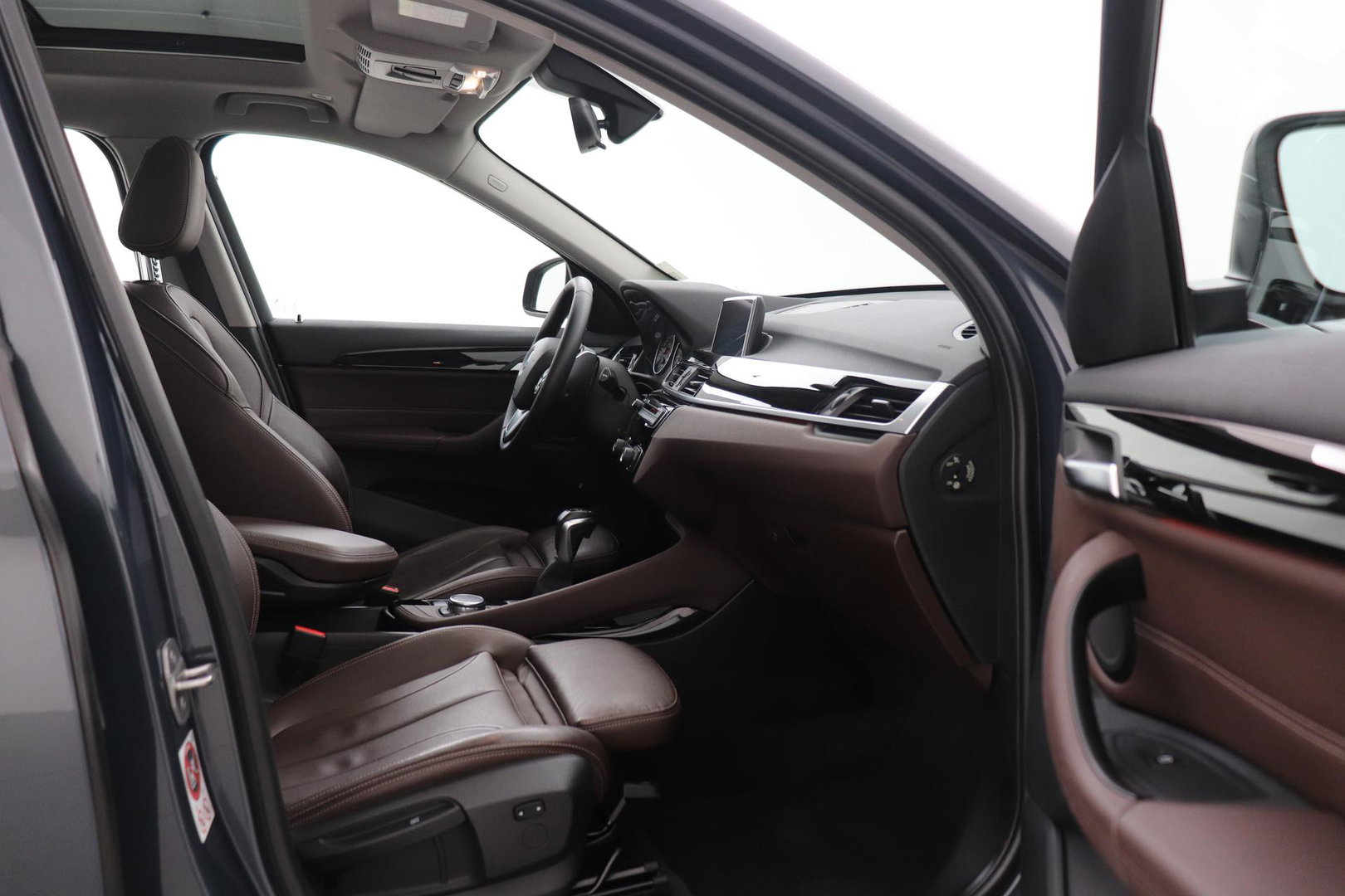 BMW X1 sDrive20i Centennial High Executive | Panoramadak | Head-Up | Vol-Leder | Stoelverwarming
