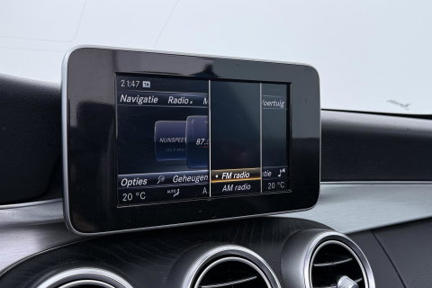 Mercedes-Benz C-Klasse Cabrio 200 Edition 1 | AMG-Line | Nekverwarming | Dodehoekassistent | Parkeerassistent | Stoelverwarming | LED | 18 Inch AMG