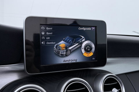 Mercedes-Benz C-Klasse Cabrio 200 Edition 1 | AMG-Line | Nekverwarming | Dodehoekassistent | Parkeerassistent | Stoelverwarming | LED | 18 Inch AMG