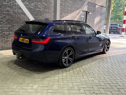 BMW 3 Serie Touring 330e xDrive | ACC | Trekhaak | Panoramadak | 360° Camera | Harman/Kardon | Head-Up | Stuurverwarming