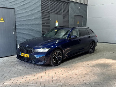 BMW 3 Serie Touring 330e xDrive | ACC | Trekhaak | Panoramadak | 360° Camera | Harman/Kardon | Head-Up | Stuurverwarming