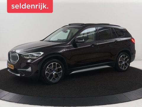 BMW X1 xDrive25e Business Edition Plus | SOH 91,4% | Panoramadak | Leder | Stoelverwarming | Sfeerverlichting | Cruise control | Navigatie | Park assist | PHEV