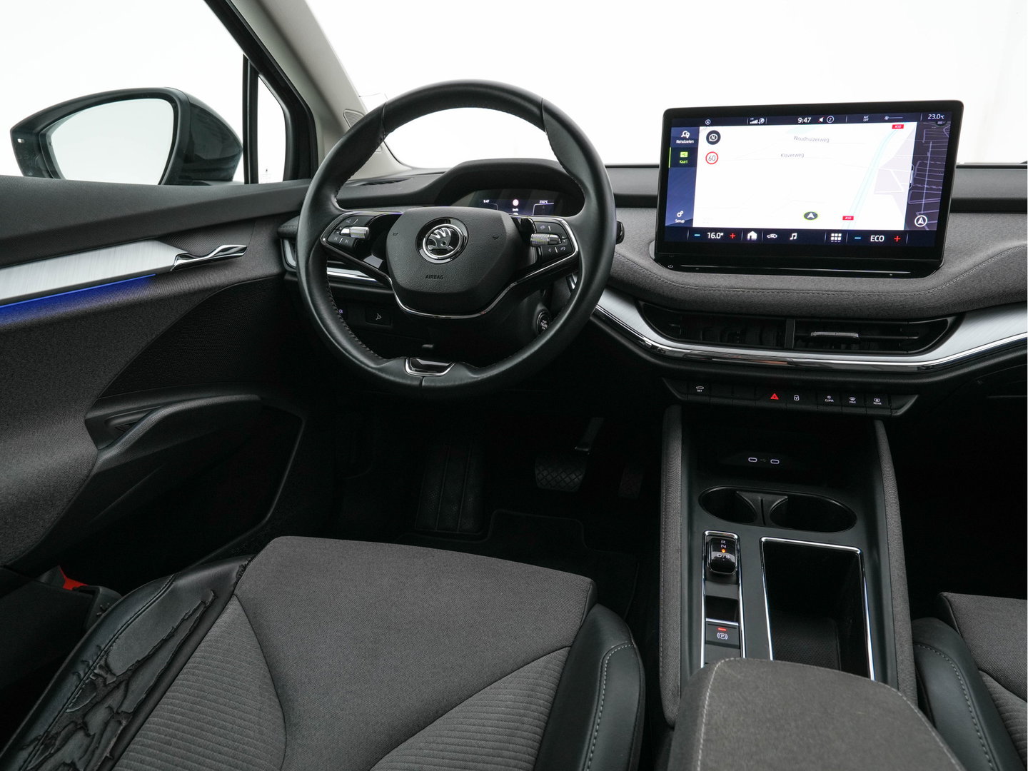 Škoda Enyaq iV 60 [ 3-Fase-11kW ] {SoH-88%} (INCL-BTW) *LEATHER-FABRIC | FULL-LED | DIGI-COCKPIT | CAMERA | KEYLESS | NAVI-FULLMAP | AMBIENTLIGHT | ECC | HEATED-COMFORTSEATS | PRIVACY-GLASS | DAB+ | PDC | CRUISE | 19"ALU*