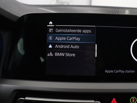 BMW 3 Serie Touring 320e Business Edition Plus | SOH 90% | Leder | Stoelverwarming | Carplay | Cruise control | Climate control | Elektrische achterklep | Park assist | PHEV