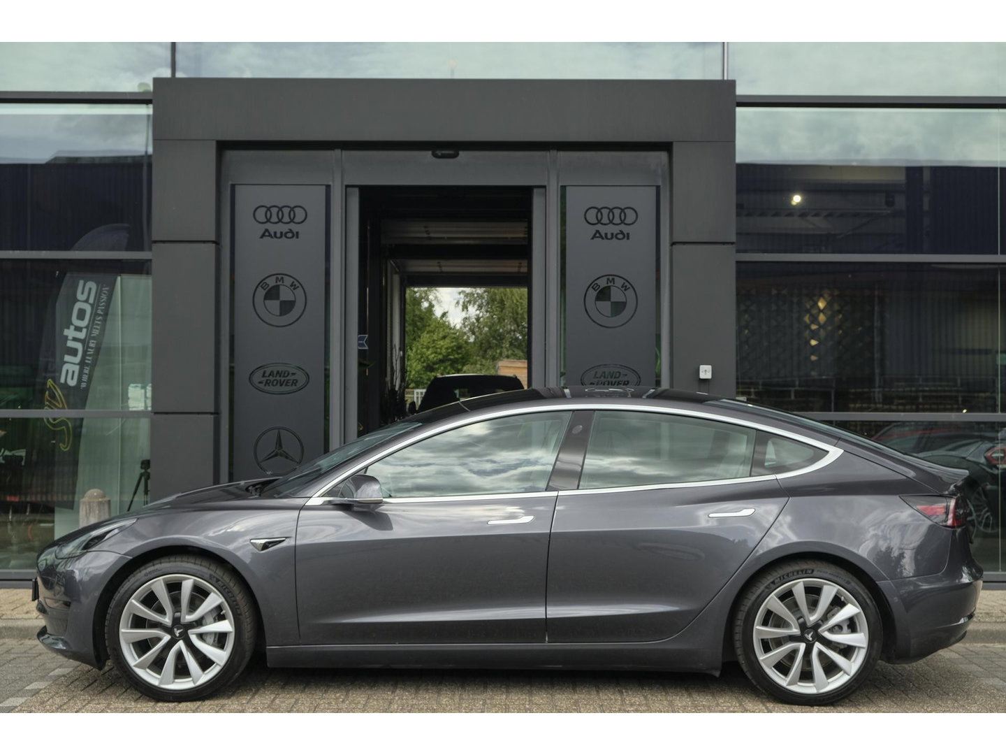 Tesla Model 3 Long Range 351pk AWD 75 kWh *BTW* *SOH 85%* Panoramadak 19" LMV Sport Autopilot
