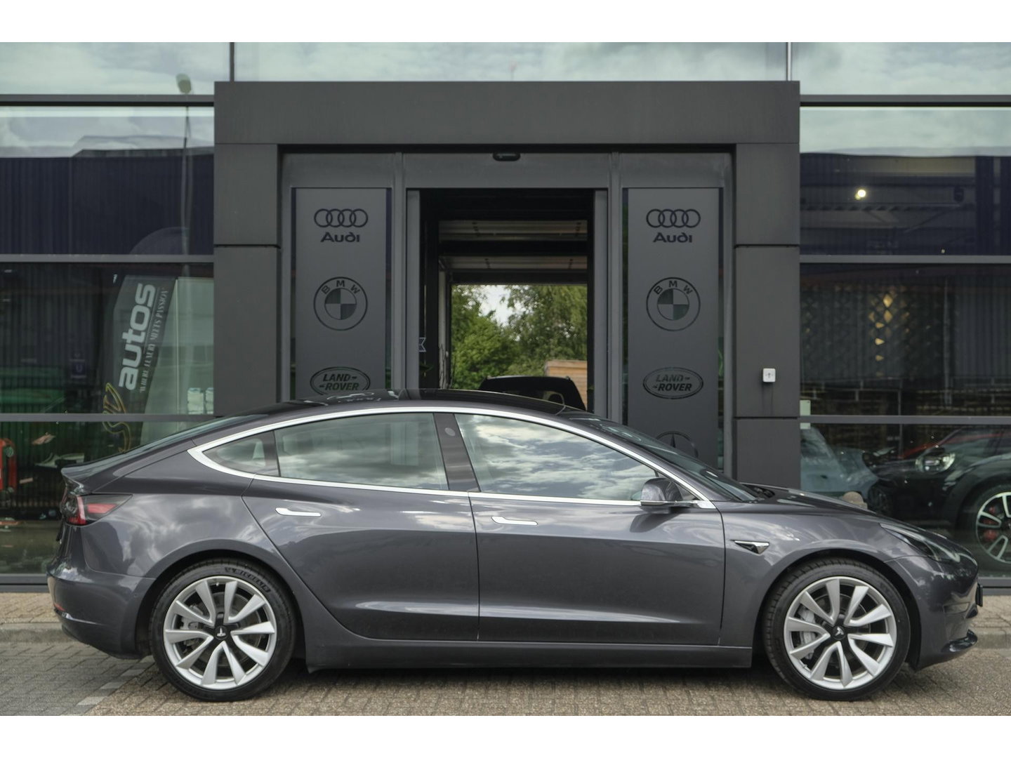 Tesla Model 3 Long Range 351pk AWD 75 kWh *BTW* *SOH 85%* Panoramadak 19" LMV Sport Autopilot