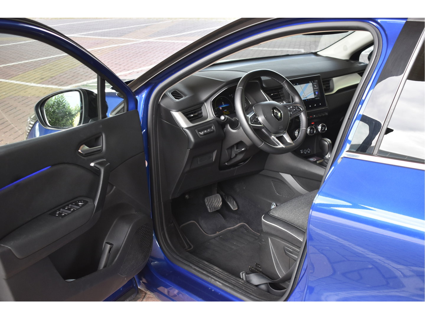 Renault Captur 1.6 E-Tech Hybrid 145 pk Intens Bi-Tone | NL-Auto | Trekhaak | Camera | Carplay/Android | DAB | Keyless | LED | Sfeerverlichting