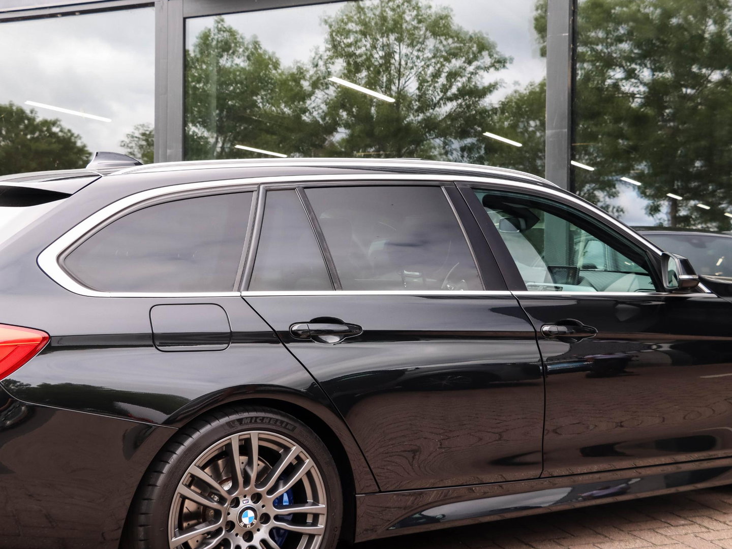 BMW 3 Serie Touring 335i xDrive M Sport High Exec. 360 Cam Pano HeadUp Trekhaak afneembaar