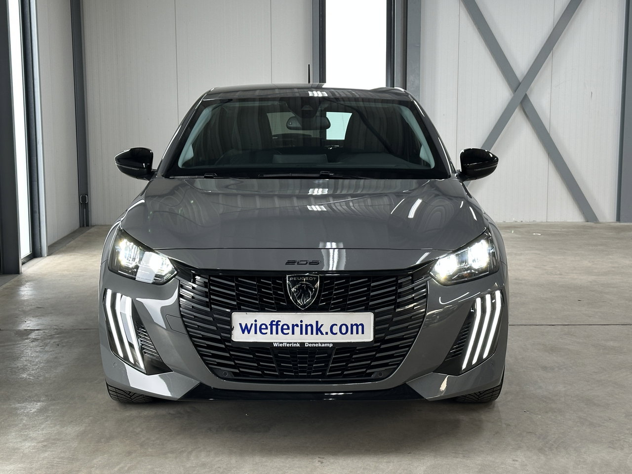 Peugeot e-208