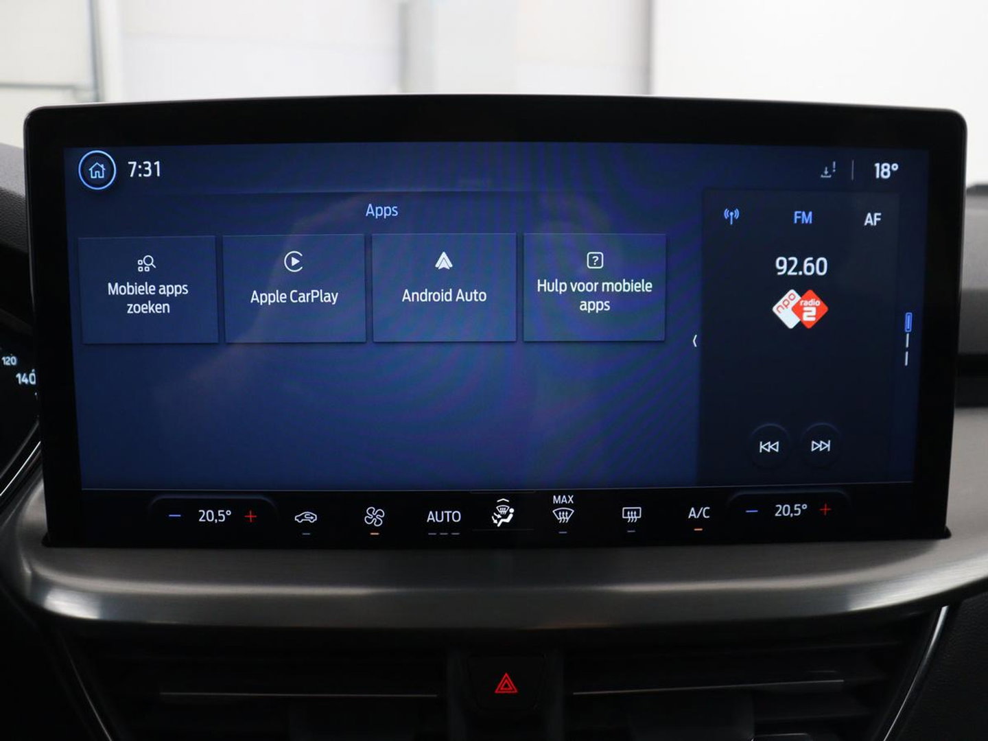 Ford Focus Wagon 1.0 EcoBoost Hybrid Titanium | Cruise control | Lane assist | Navigatie | Carplay | Park assist | Climate control