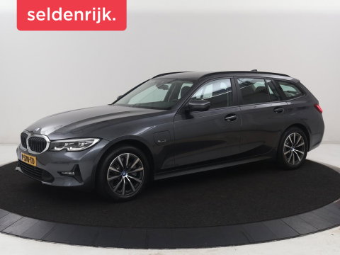 BMW 3 Serie Touring 320e Business Edition Plus | SOH 90% | Leder | Stoelverwarming | Carplay | Cruise control | Climate control | Elektrische achterklep | Park assist | PHEV