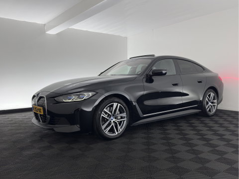 BMW i4 eDrive40 High Executive 84 kWh [3-Fase-11kW] {SoH-98%} (INCL.BTW) *PANO | HEAD-UP | LEATHER | LASER-LED | HARMAN/KARDON | HEATED-SPORTSEATS | WIDESCREEN-DIGI-COCKPIT | CAMERA | DAB+ | PRIVACY-GLASS | NAVI-FULLMAP | ECC | PDC | 18''ALU*