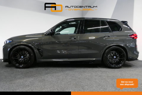 BMW X5 xDrive50e M Sport / M Bodykit / Achterasbesturing / Panoramadak / Elektr. verstelbare voorstoelen + memory / Softclose / Luchtvering / Elektr. wegklapbare trekhaak / HUD Professional / Harman Kardon Surround Sound / 22'' LMV / Ambienteverlichting / Stoelv