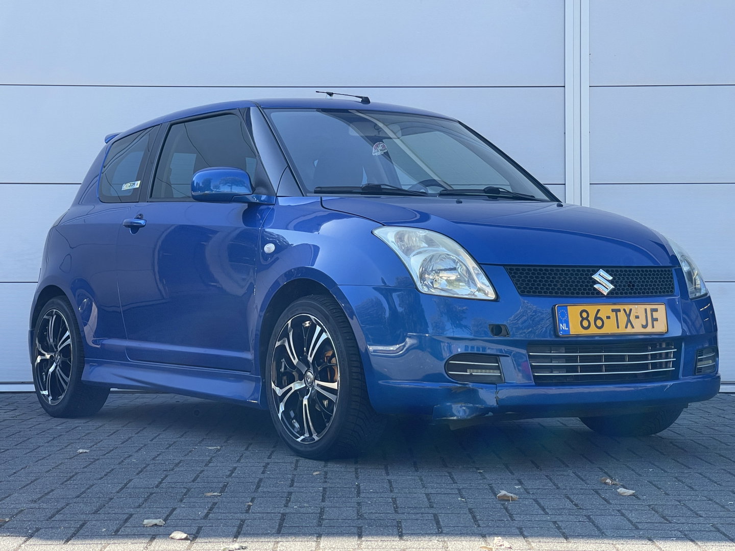 Suzuki Swift 1.3 GLS | Licht metalen velgen 17'' | Subwoofers | Airconditioning | Elektrische ramen | Bluetooth | Centrale deurvergrendeling |