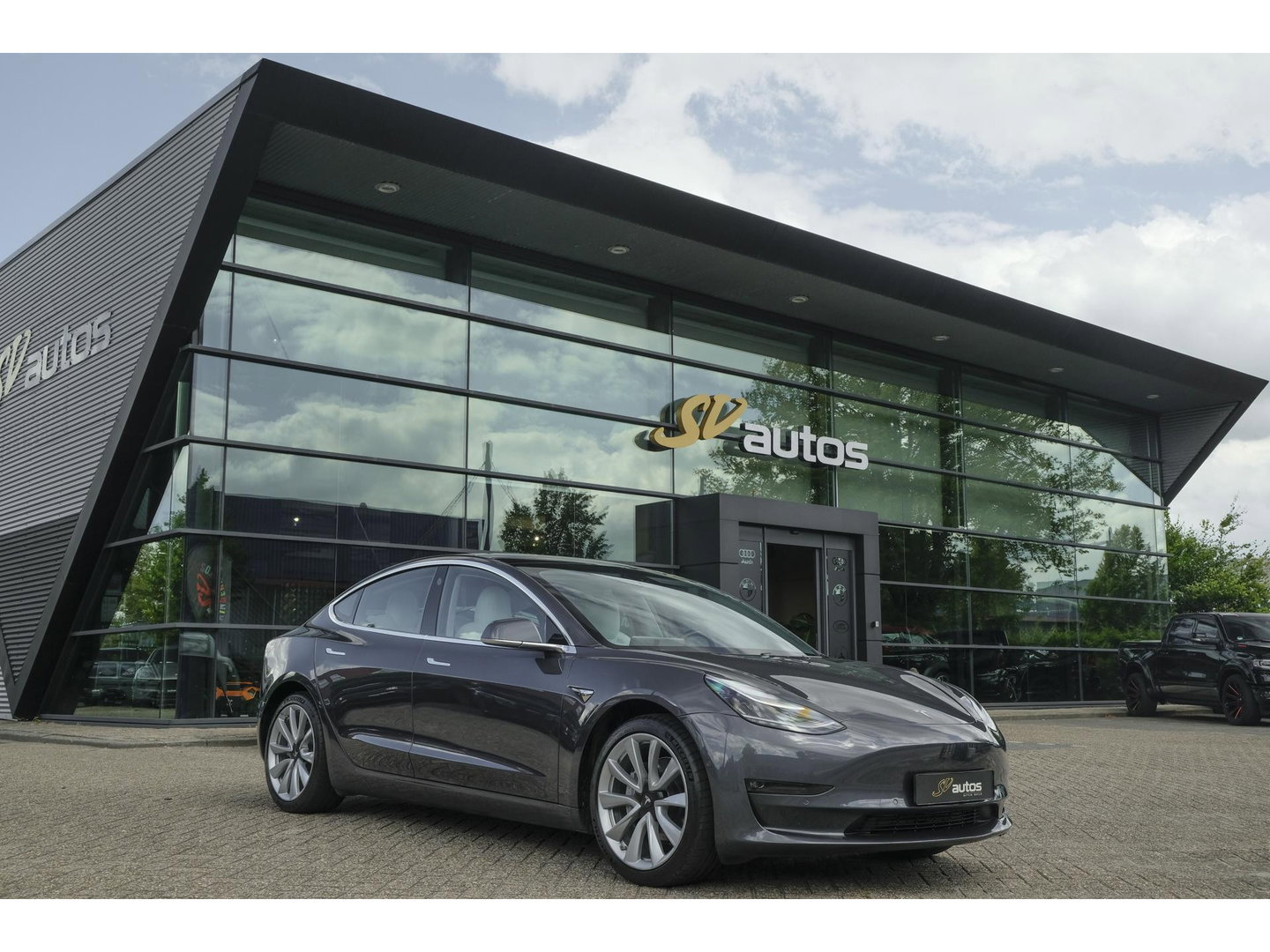 Tesla Model 3 Long Range 351pk AWD 75 kWh *BTW* *SOH 85%* Panoramadak 19" LMV Sport Autopilot