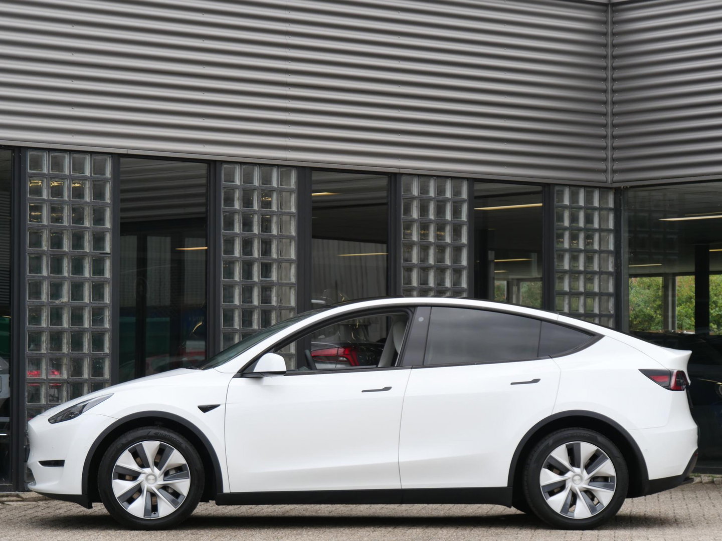 Tesla Model Y 75kWh AWD LONG RANGE/ ELEKT. KLEP/ PREMIUM AUDIO/ SOH 94%/ NL-AUTO 1STE EIGENAAR
