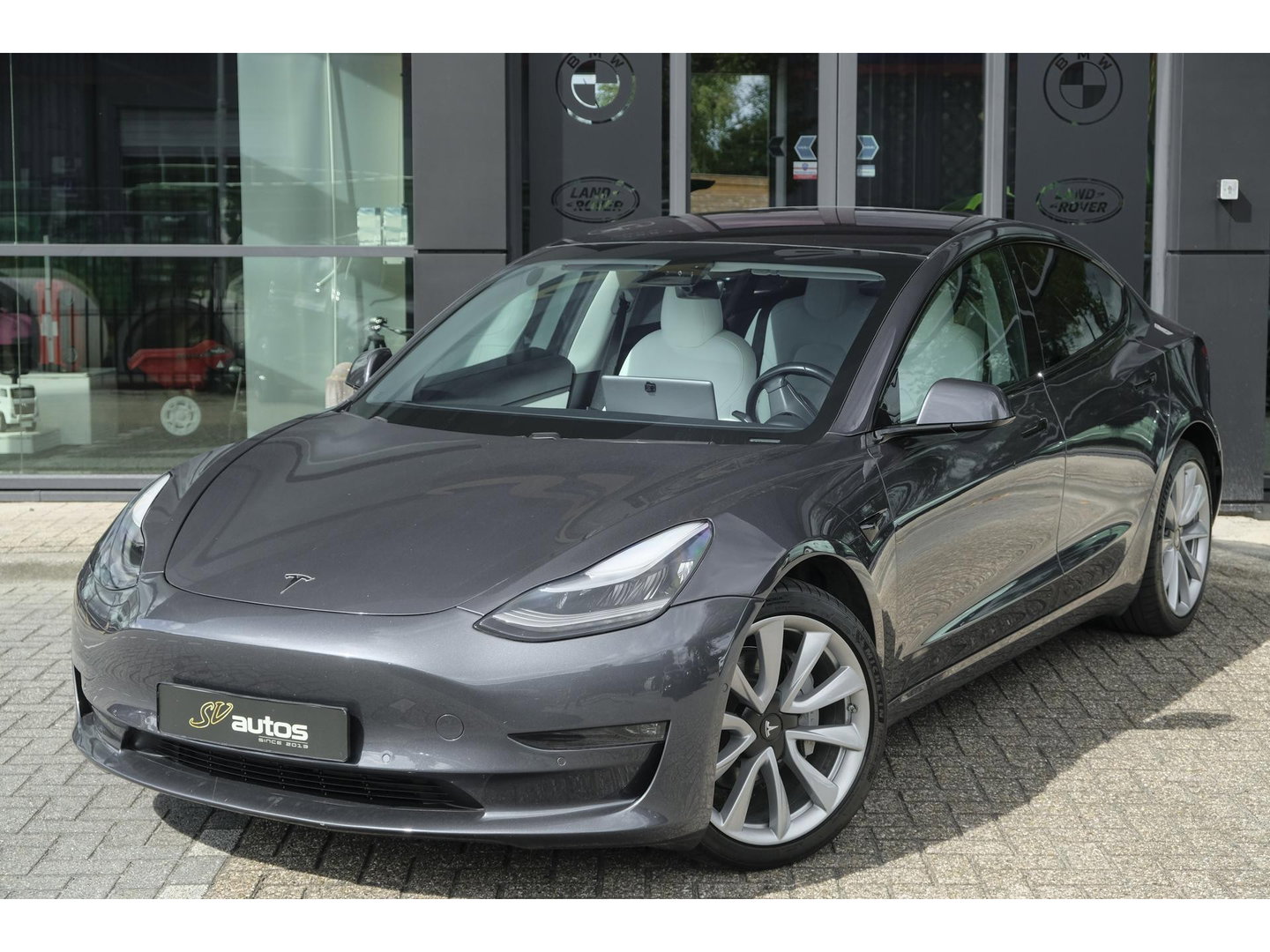 Tesla Model 3 Long Range 351pk AWD 75 kWh *BTW* *SOH 85%* Panoramadak 19" LMV Sport Autopilot