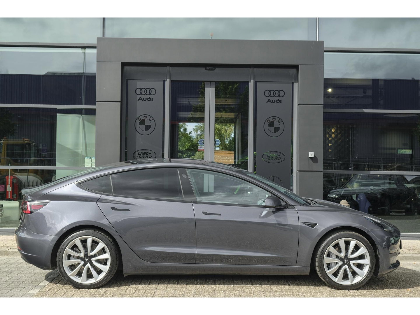 Tesla Model 3 Long Range 351pk AWD 75 kWh *BTW* *SOH 85%* Panoramadak 19" LMV Sport Autopilot