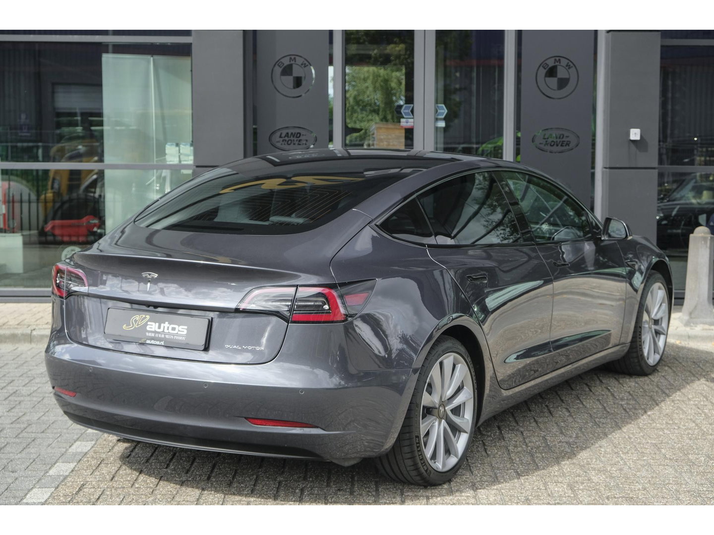 Tesla Model 3 Long Range 351pk AWD 75 kWh *BTW* *SOH 85%* Panoramadak 19" LMV Sport Autopilot
