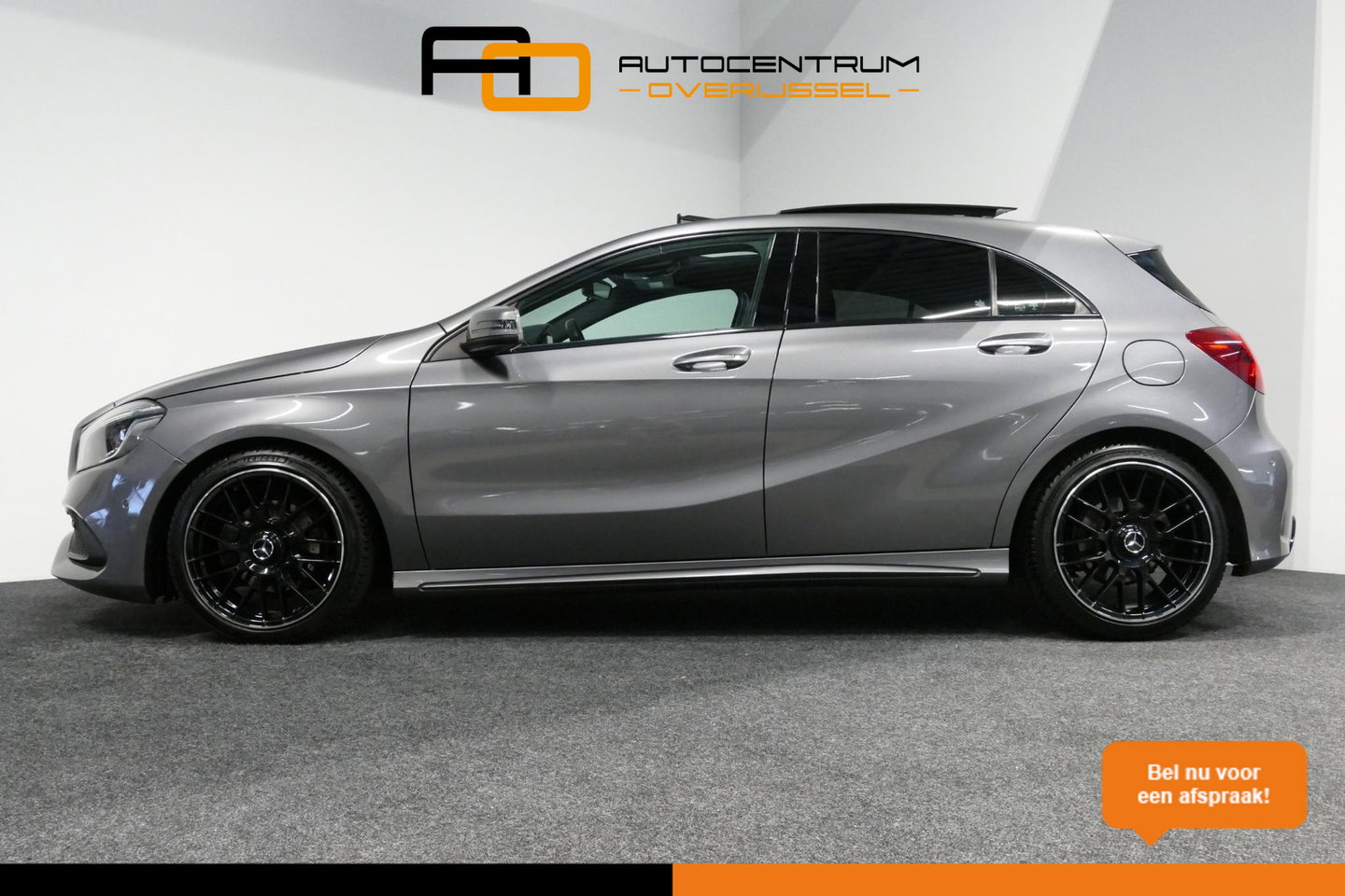 Mercedes-Benz A-Klasse 200 AMG Line / A45 AMG Diffuser / Panamericana Grille / Panoramadak / Carbon interieurdelen / Stoelverwarming / LED High Performance / Cruise Control / 18'' LMV / Agility Control / PDC V+A
