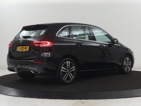 Mercedes-Benz B-klasse250 e Business Solution Luxury Limited | SOH 93,0% | Leder | Stoelverwarming | Adaptive cruise | Carplay | Camera | Park assist | Sfeerverlichting | Elektrische achterlep | Trekhaak