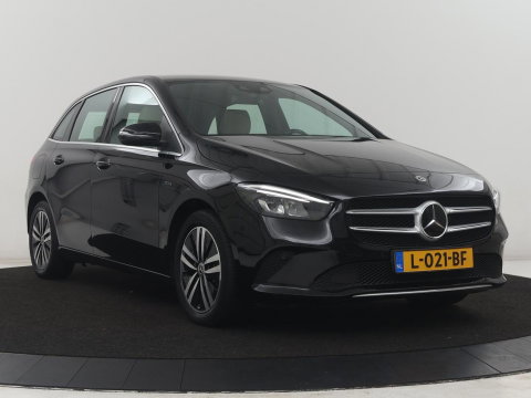 Mercedes-Benz B-klasse250 e Business Solution Luxury Limited | SOH 93,0% | Leder | Stoelverwarming | Adaptive cruise | Carplay | Camera | Park assist | Sfeerverlichting | Elektrische achterlep | Trekhaak