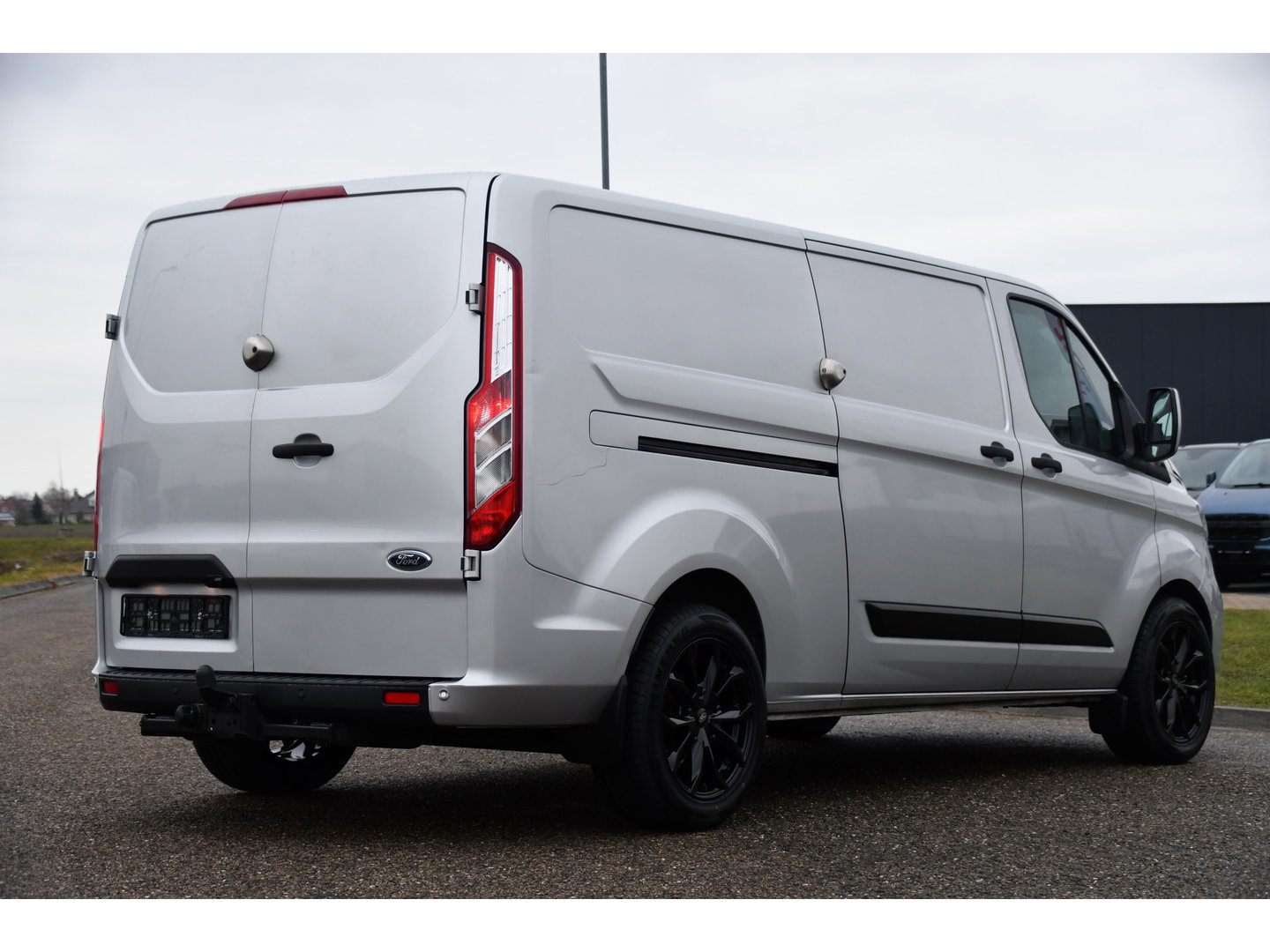 Ford Transit Custom 300 2.0 TDCI L2H1 Raptor Edition Camera, Cruise, Caprlay, Automaat, PDC, Multimedia, Stoelverwarming, Standkachel, Uniek!