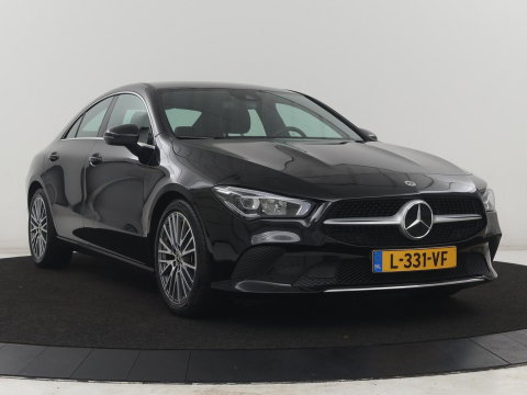 Mercedes-Benz CLA-Klasse 180 Business Solution Luxury | Leder | Stoelverwarming | Cruise control | Sfeerverlichting | Navigatie | Bluetooth | Camera | Park assist | Climate control