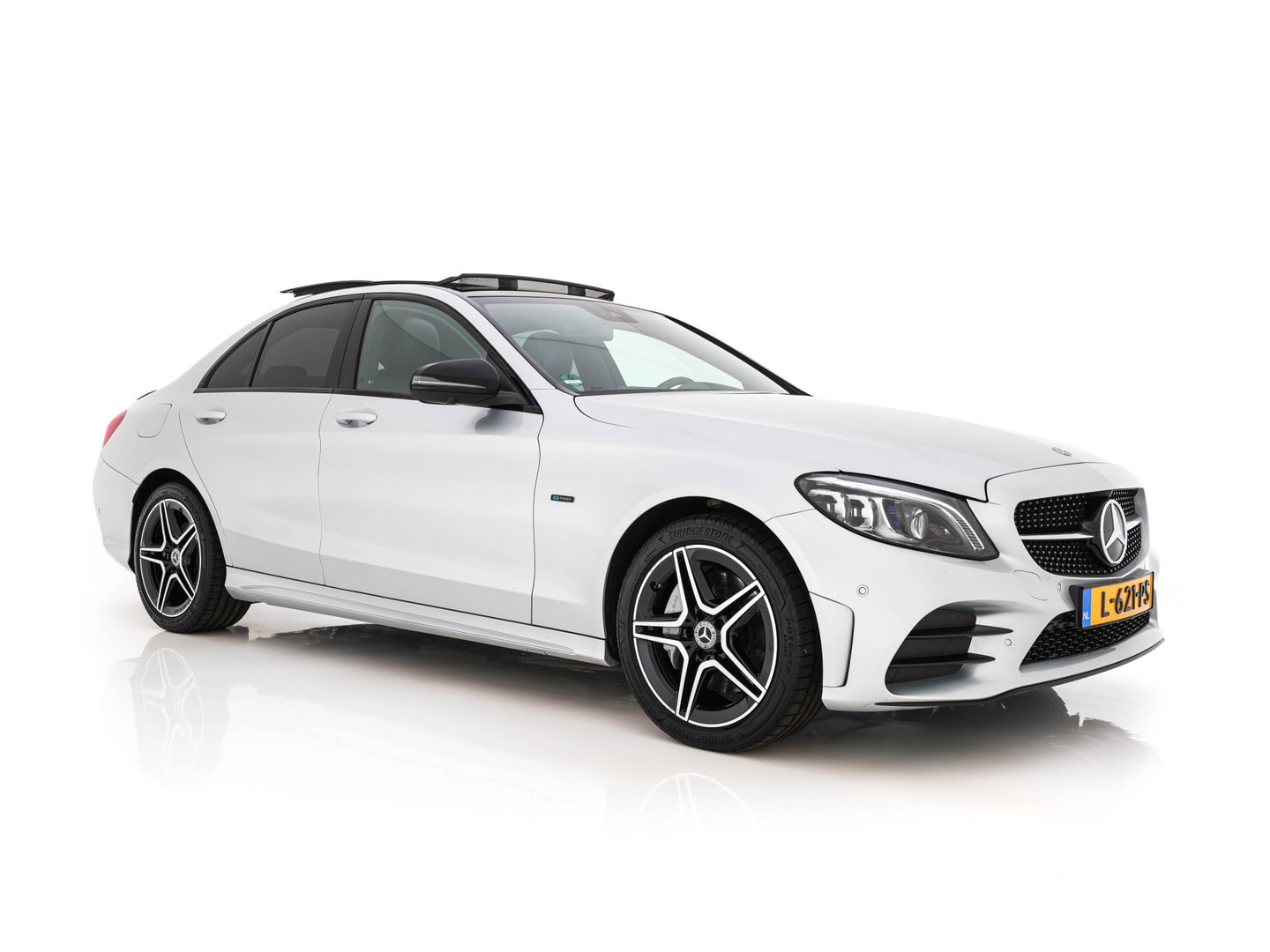 Mercedes-Benz C-Klasse 300 e Business Solution AMG Limited (Plug-in) {SoH-94%} (INCL.BTW) Aut. *PANO | LEATHER-FABRIC | MULTIBEAM-LED | TOP-VIEW | DIGI-COCKPIT | BLIND-SPOT | HEATED-SPORTSEATS | SHIFT-PADDLES | NAVI-FULLAMP | PRIVACY-GLASS | PDC | CRUISE | TOWBAR | 18''