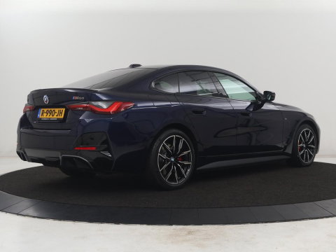 BMW i4 M50 High Executive 84 kWh | SOH 94,4% | Leder | Adaptive cruise | xDrive |  Stoelverwarming | Head-up | Harman/Kardon | Carplay | Sfeerverlichting | 360 camera | Park assist | Elektrische achterklep
