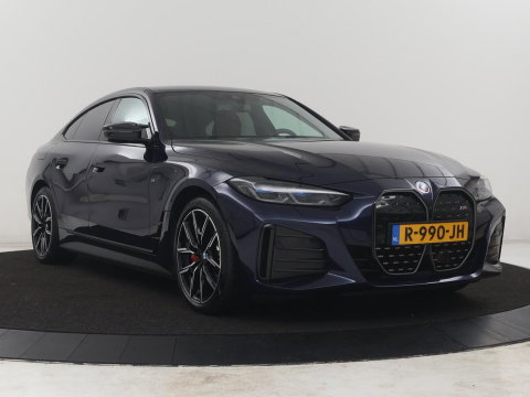 BMW i4 M50 High Executive 84 kWh | SOH 94,4% | Leder | Adaptive cruise | xDrive |  Stoelverwarming | Head-up | Harman/Kardon | Carplay | Sfeerverlichting | 360 camera | Park assist | Elektrische achterklep