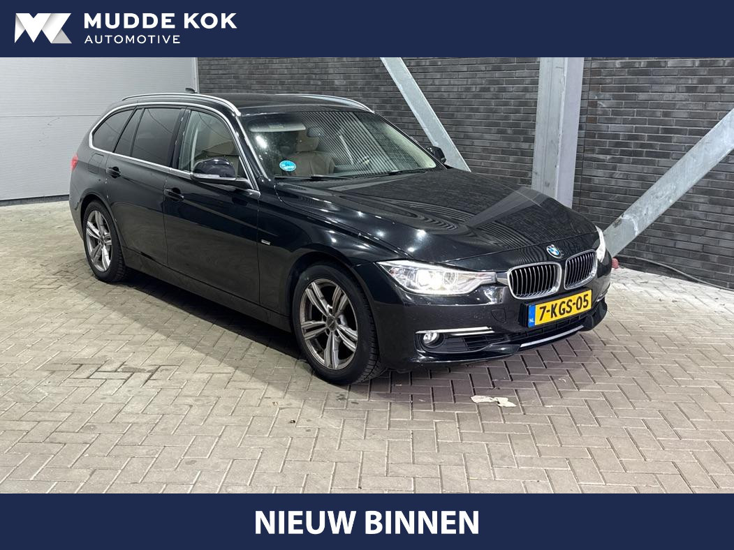 BMW 3 Serie Touring 320i Upgrade Edition | Trekhaak | Leder | Navigatie | PDC | Stoelverwarming