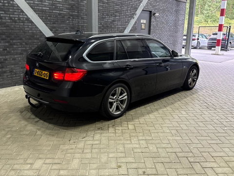 BMW 3 Serie Touring 320i Upgrade Edition | Trekhaak | Leder | Navigatie | PDC | Stoelverwarming