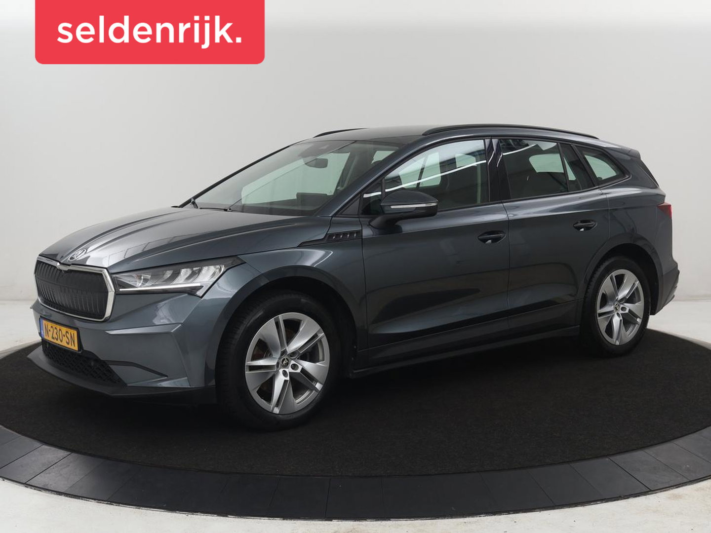 Škoda Enyaq iV 60 | SOH 93,0% | Half leder | Cruise control | Carplay | Climate control | Lane assist | Park assist | Trekhaak | Sfeerverlichting | Navigatie | Bluetooth