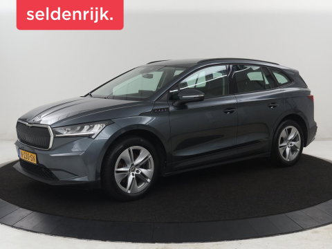 Škoda Enyaq iV 60 | SOH 93,0% | Half leder | Cruise control | Carplay | Climate control | Lane assist | Park assist | Trekhaak | Sfeerverlichting | Navigatie | Bluetooth