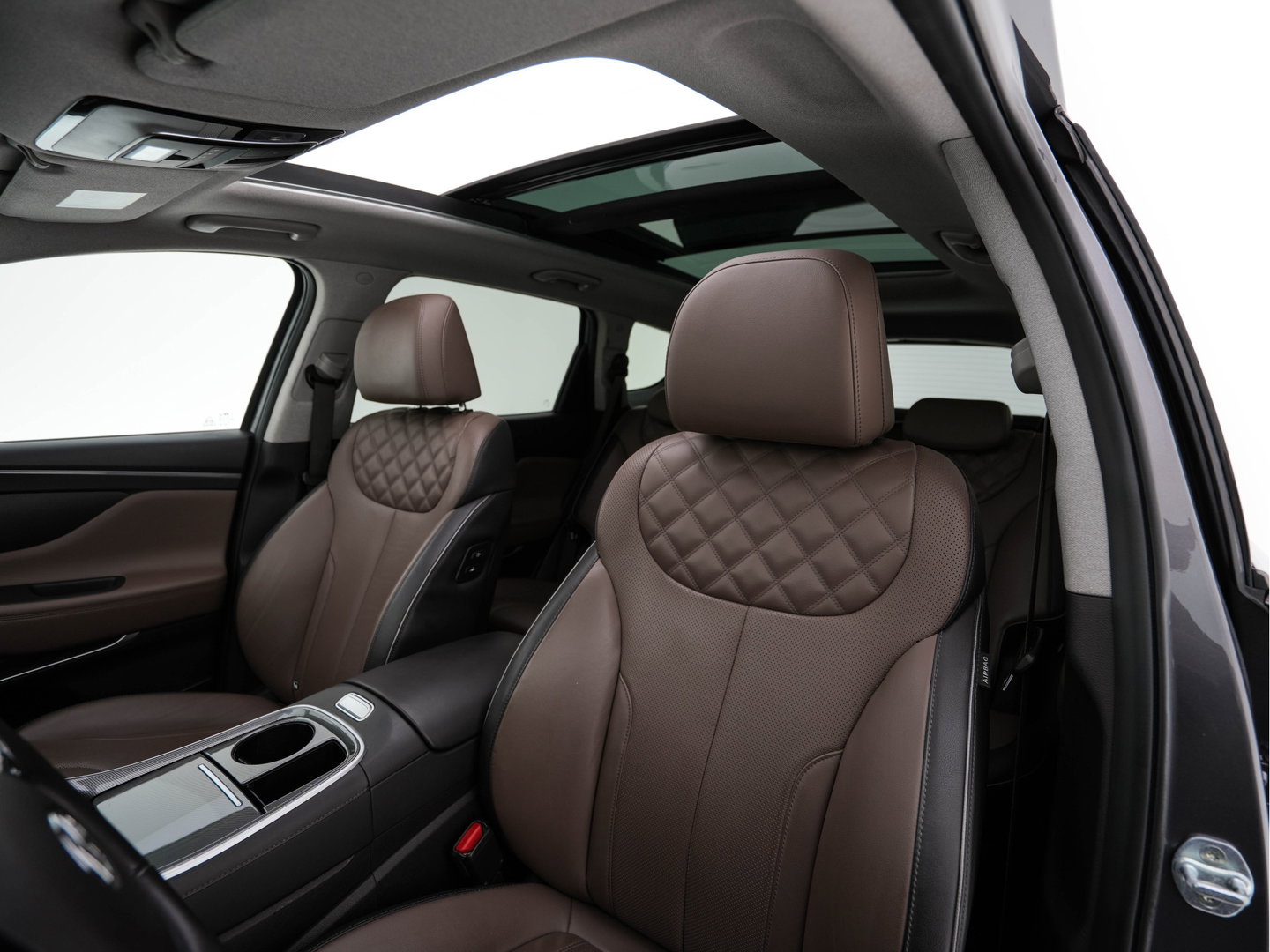 Hyundai Santa Fe 1.6 T-GDI Comfort Smart Sky AWD [ 7-Pers. ] {SoH-100%} (Plug-In) (INCL-BTW) *PANO | LEATHER | FULL-LED | ADAPTIVE-CRUISE | BLINDSPOT | MEMORY-PACK | DIGI-COCKPIT | SHIFTPADDLES | PRIVACYGLASS | NAVI-FULLMAP | KEYLESS | TOWBAR | CARBON | 19''ALU*