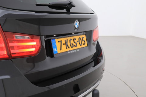 BMW 3 Serie Touring 320i Upgrade Edition | Trekhaak | Leder | Navigatie | PDC | Stoelverwarming