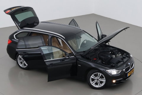 BMW 3 Serie Touring 320i Upgrade Edition | Trekhaak | Leder | Navigatie | PDC | Stoelverwarming
